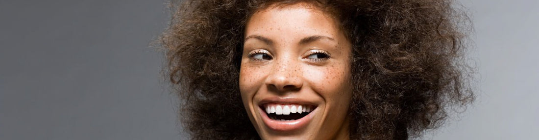 Como disciplinar cabelos afro