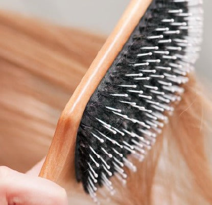Escolha uma escova de cabelo adequada para si